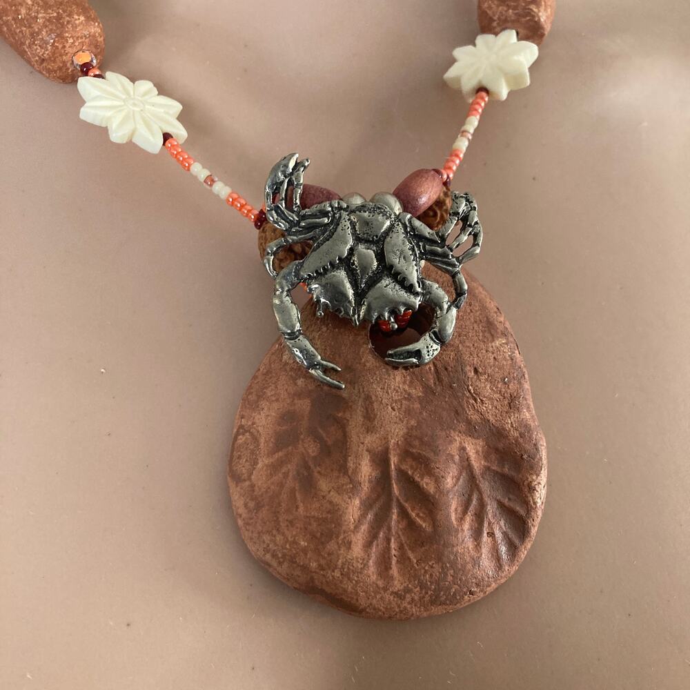 tribal crab on on stone beaded necklace crustacean